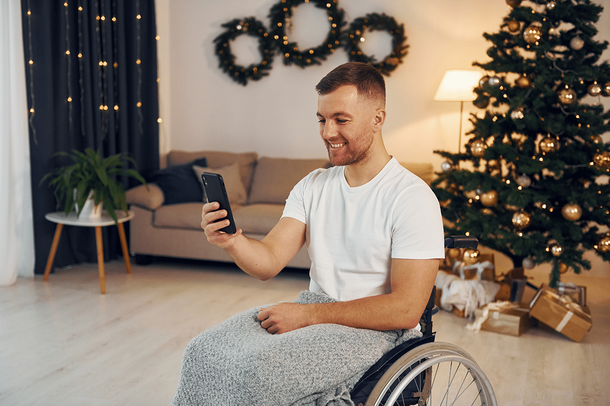 man in wheelchair celebrating new year
