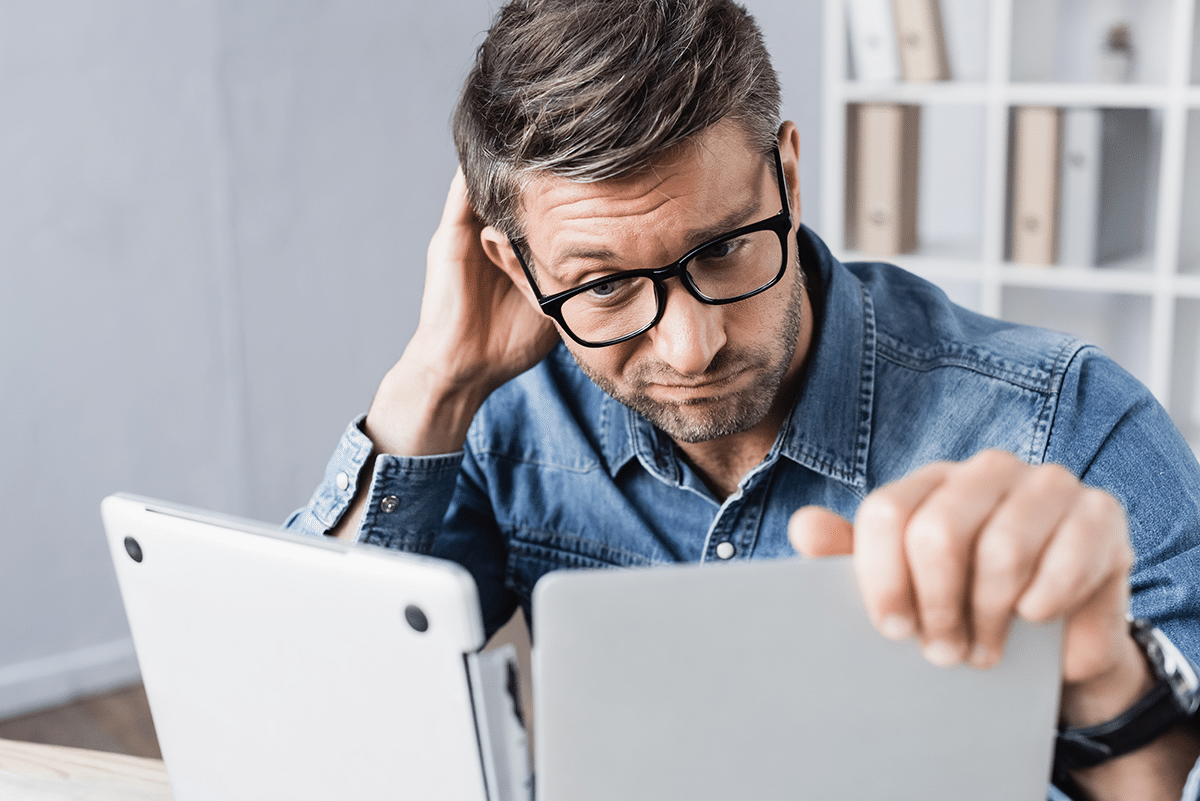 A federal worker looking at a computer